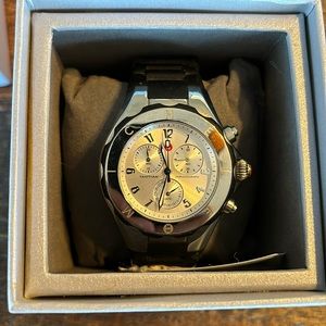 Woman’s  with tags Michele watch Black